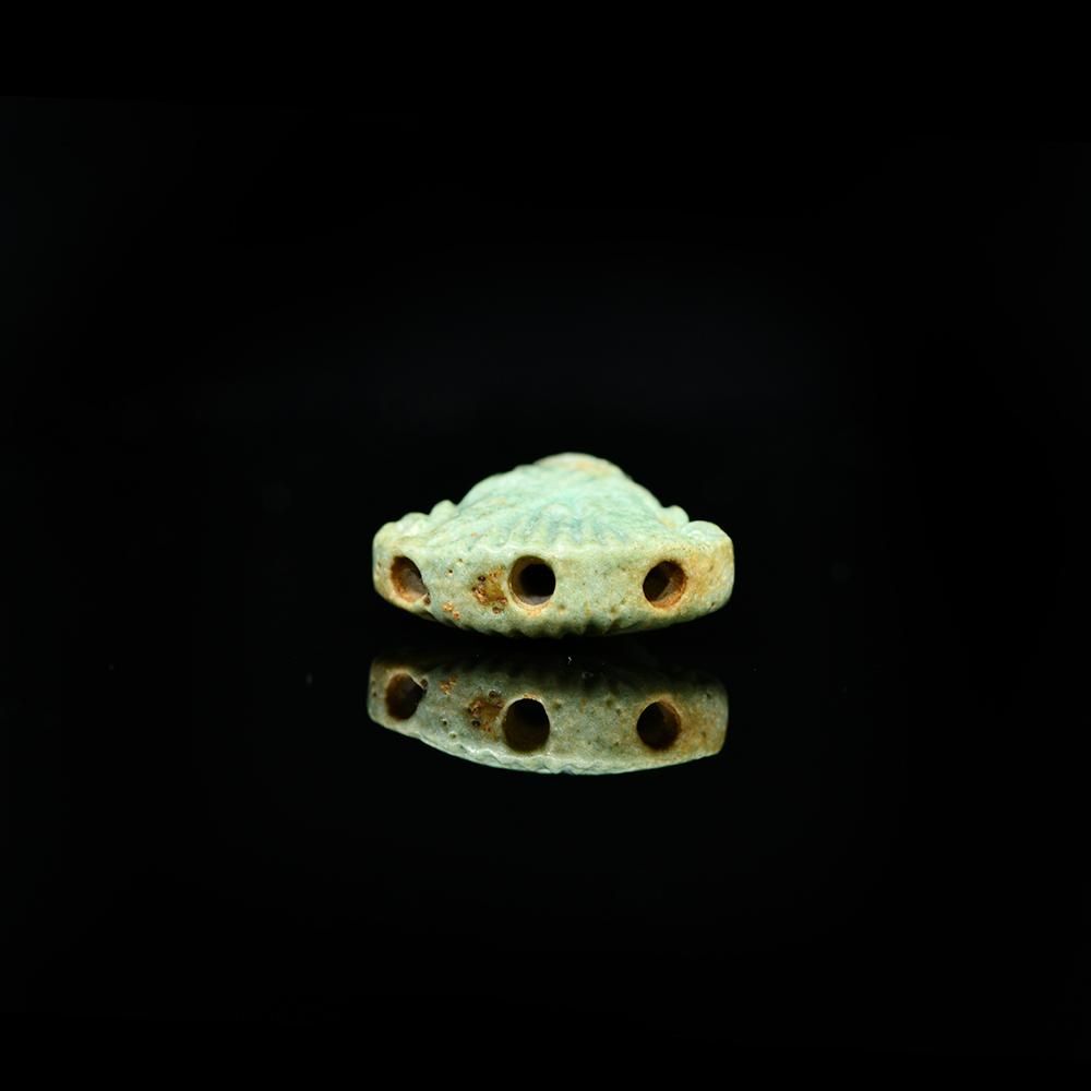 An Egyptian Faience Lotus Terminal, Late Period, ca. 664 - 332 BCE