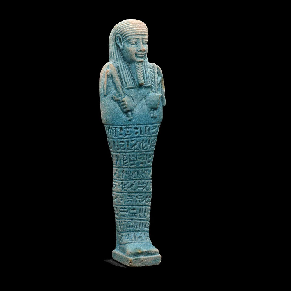 An Egyptian Blue Glazed Faience Ushabti for Nes-Ptah, Late Period, 30th Dynasty, ca. 380-332 BCE