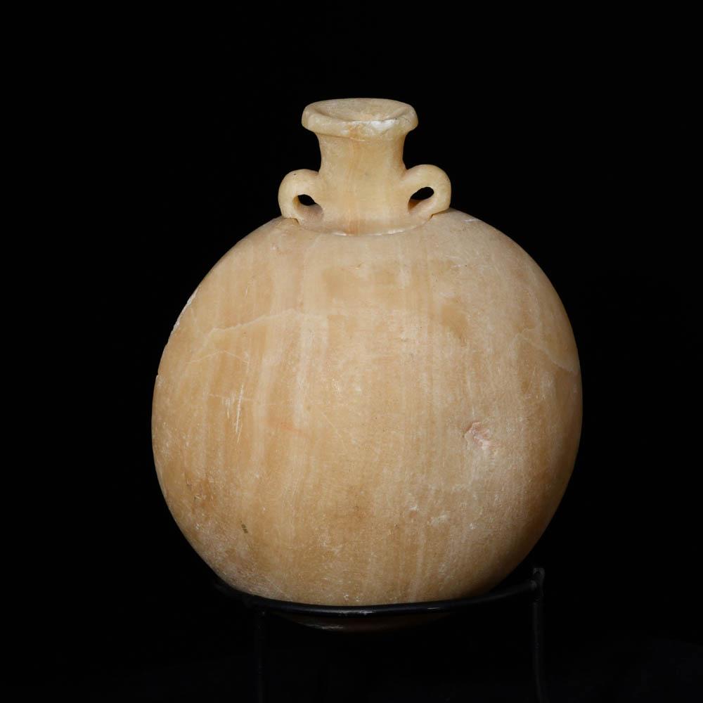 An Egyptian Alabastron with a detachable lid, Late - Ptolemaic Period, ca. 664 - 30 BCE