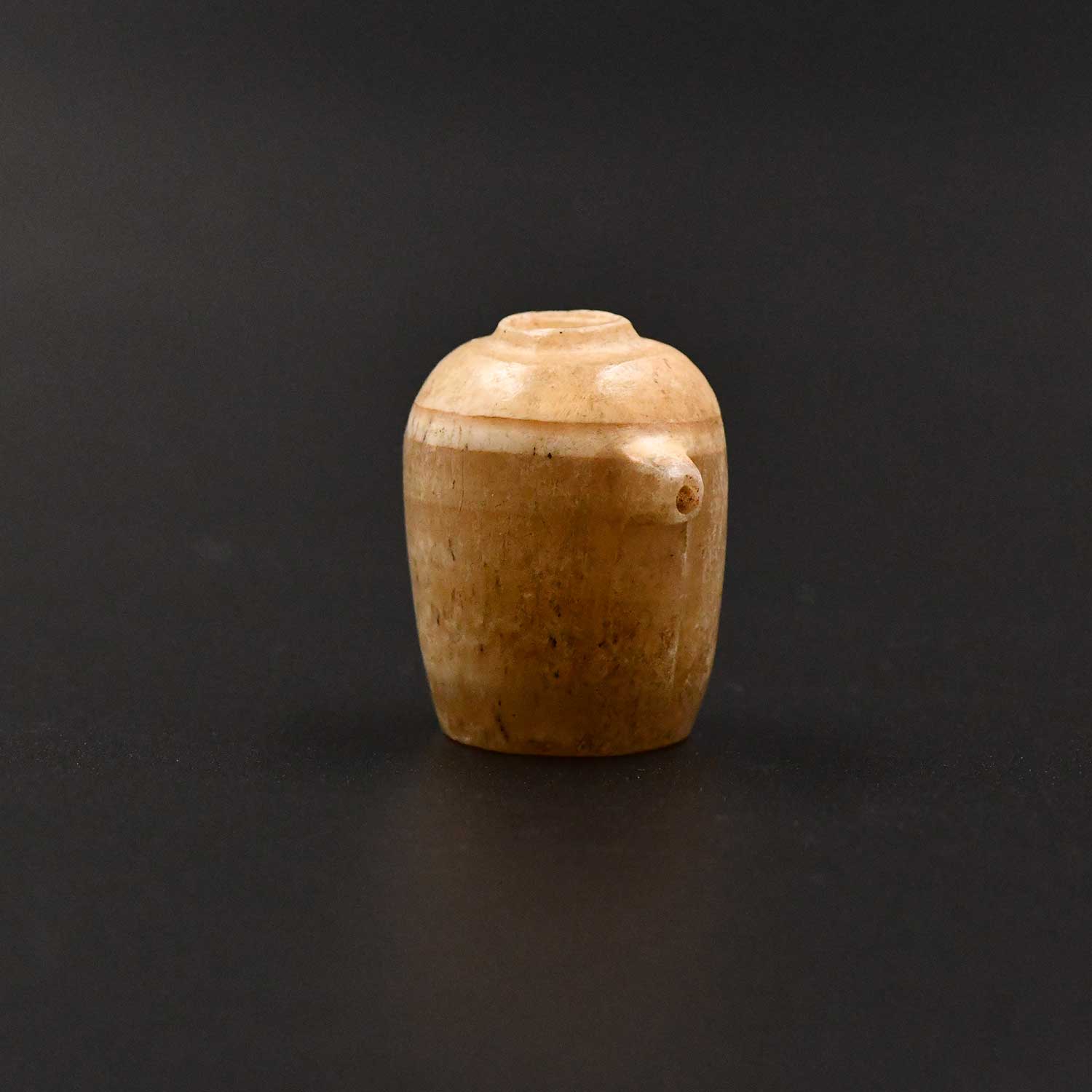 An Egyptian Alabaster Model Libation (nemset) Jar, Old Kingdom, ca. 2775 – 2650 BCE