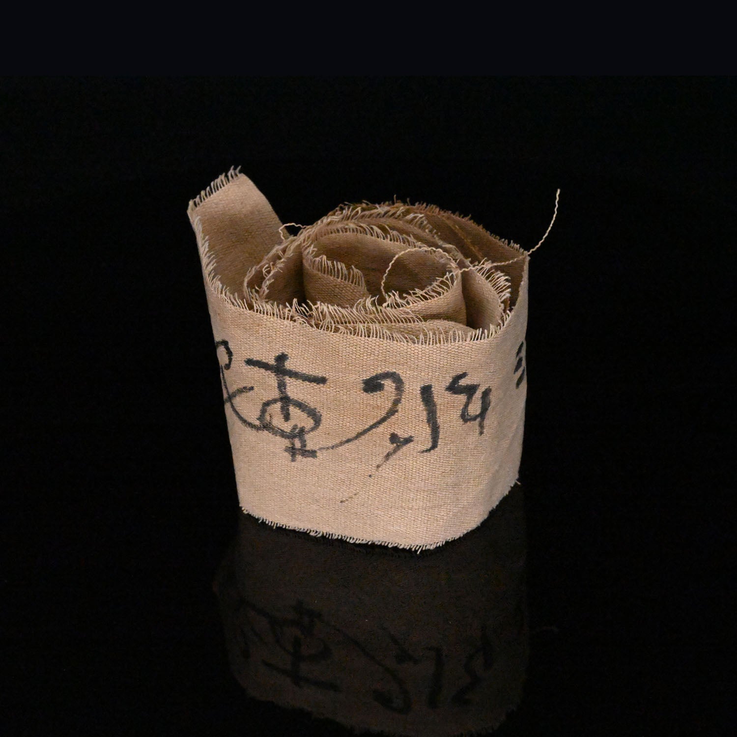 A long Egyptian demotic inscribed mummy linen fragment<br><em>Late Period, ca. 664-332 BCE</em>