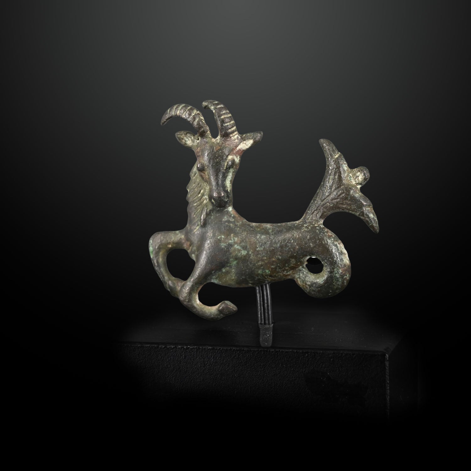 A fine Persian Bronze fitting of Capricornus, Achaemenid Empire, ca. 550 - 330 BCE