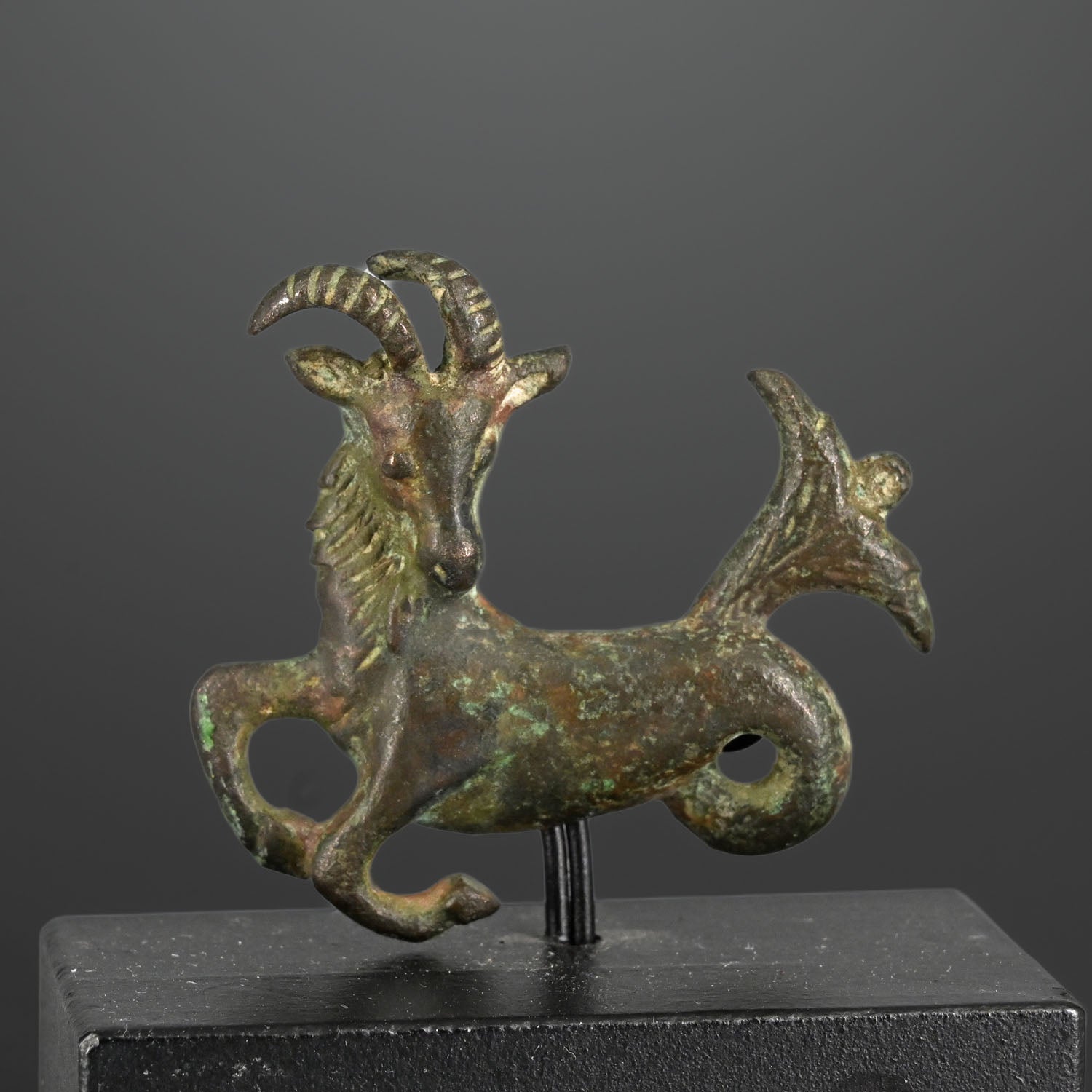 A fine Persian Bronze fitting of Capricornus, Achaemenid Empire, ca. 550 - 330 BCE