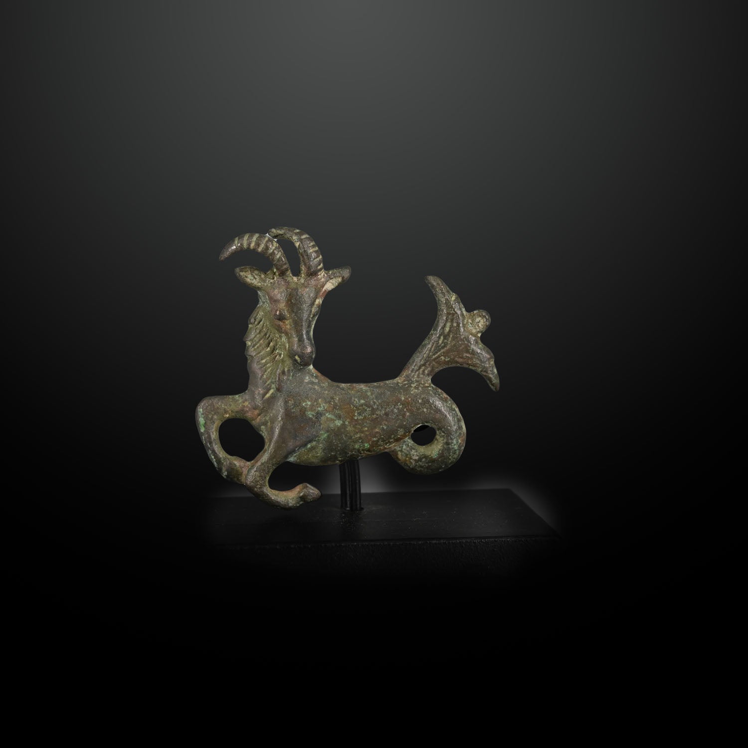 A fine Persian Bronze fitting of Capricornus, Achaemenid Empire, ca. 550 - 330 BCE