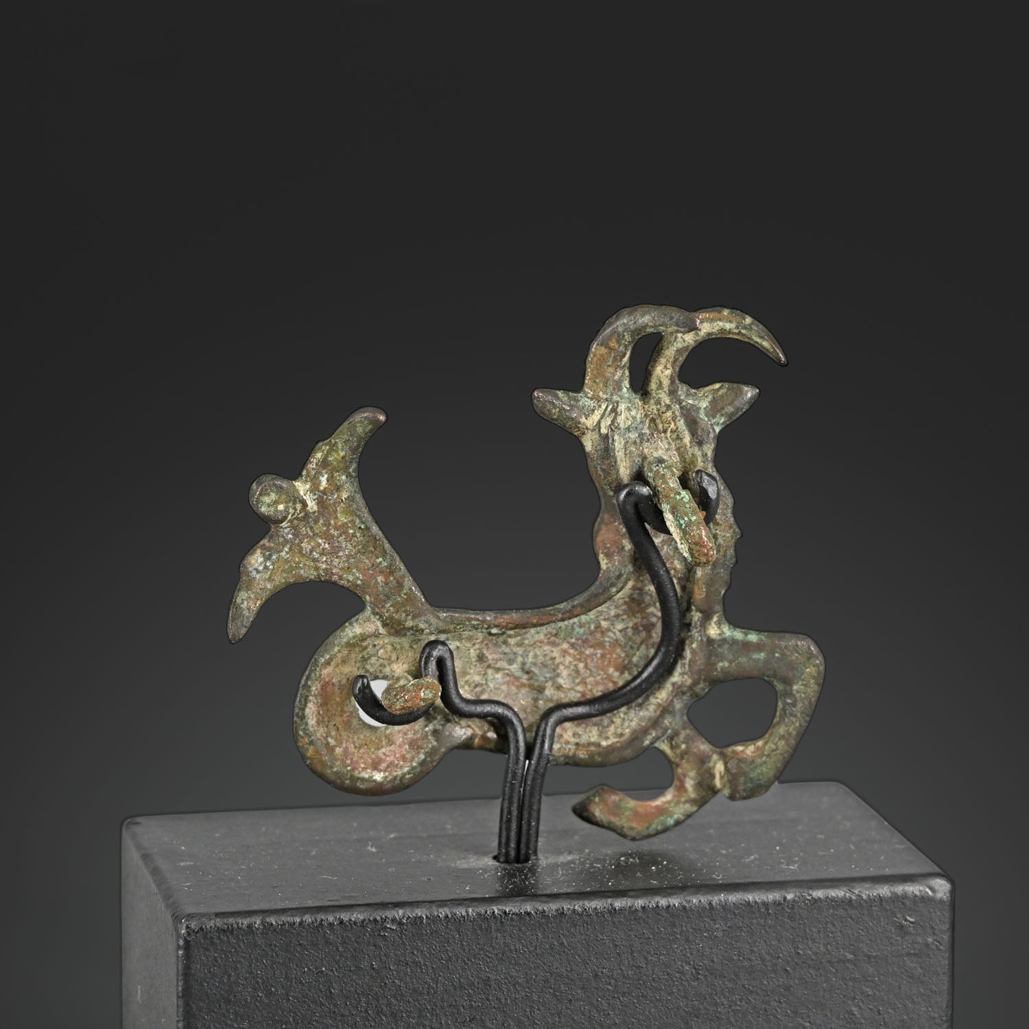 A fine Persian Bronze fitting of Capricornus, Achaemenid Empire, ca. 550 - 330 BCE