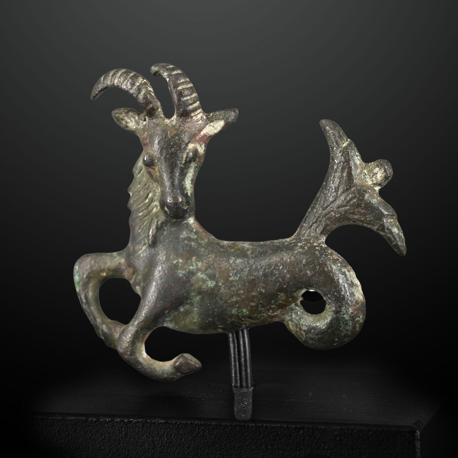 A fine Persian Bronze fitting of Capricornus, Achaemenid Empire, ca. 550 - 330 BCE