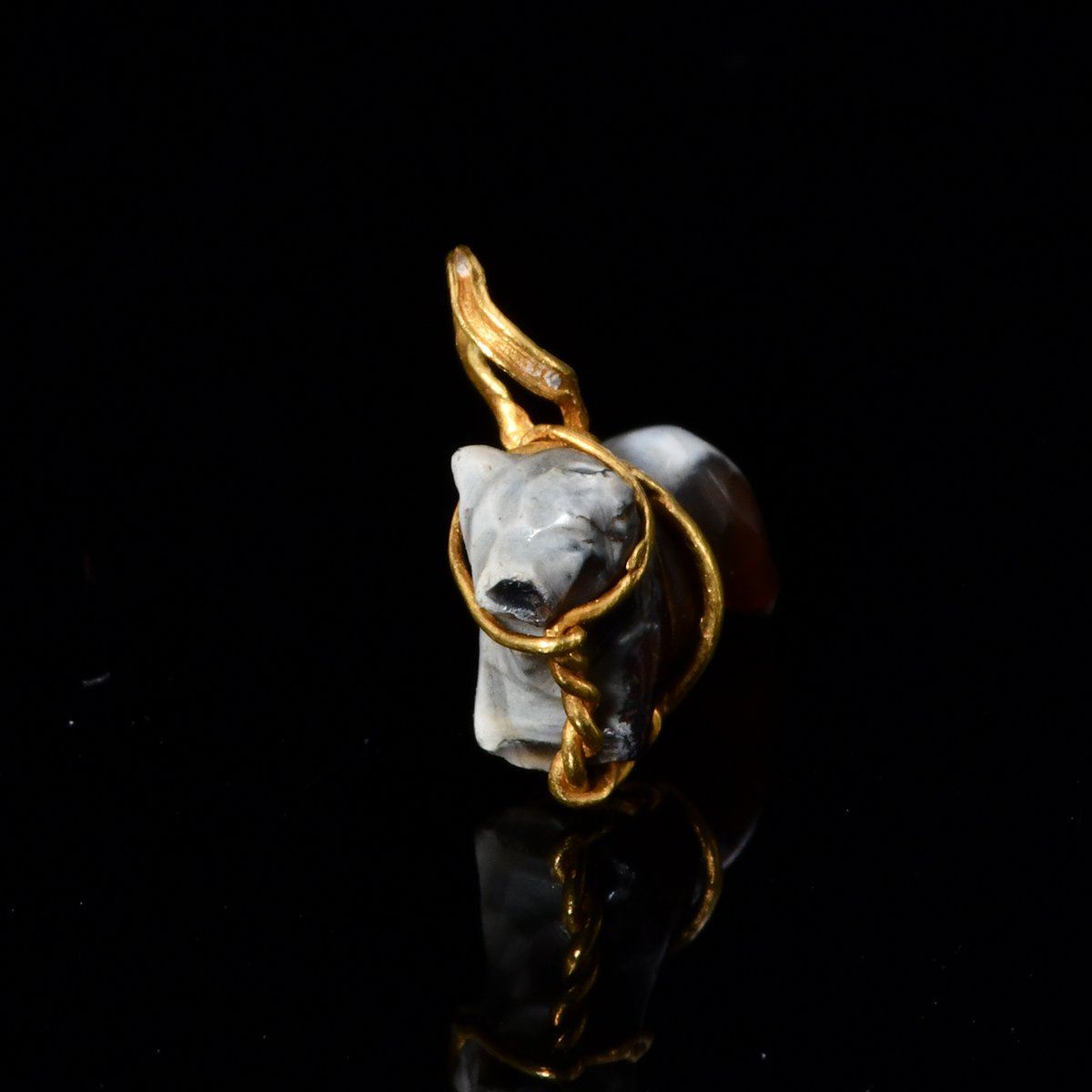 A rare middle Assyrian Bull Pendant, ca. 16th - 10th century BCE