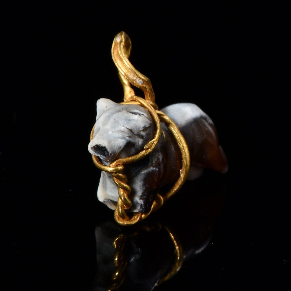 A rare middle Assyrian Bull Pendant, ca. 16th - 10th century BCE