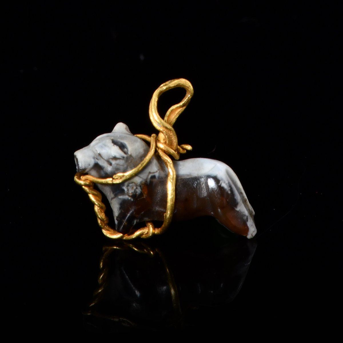 A rare middle Assyrian Bull Pendant, ca. 16th - 10th century BCE