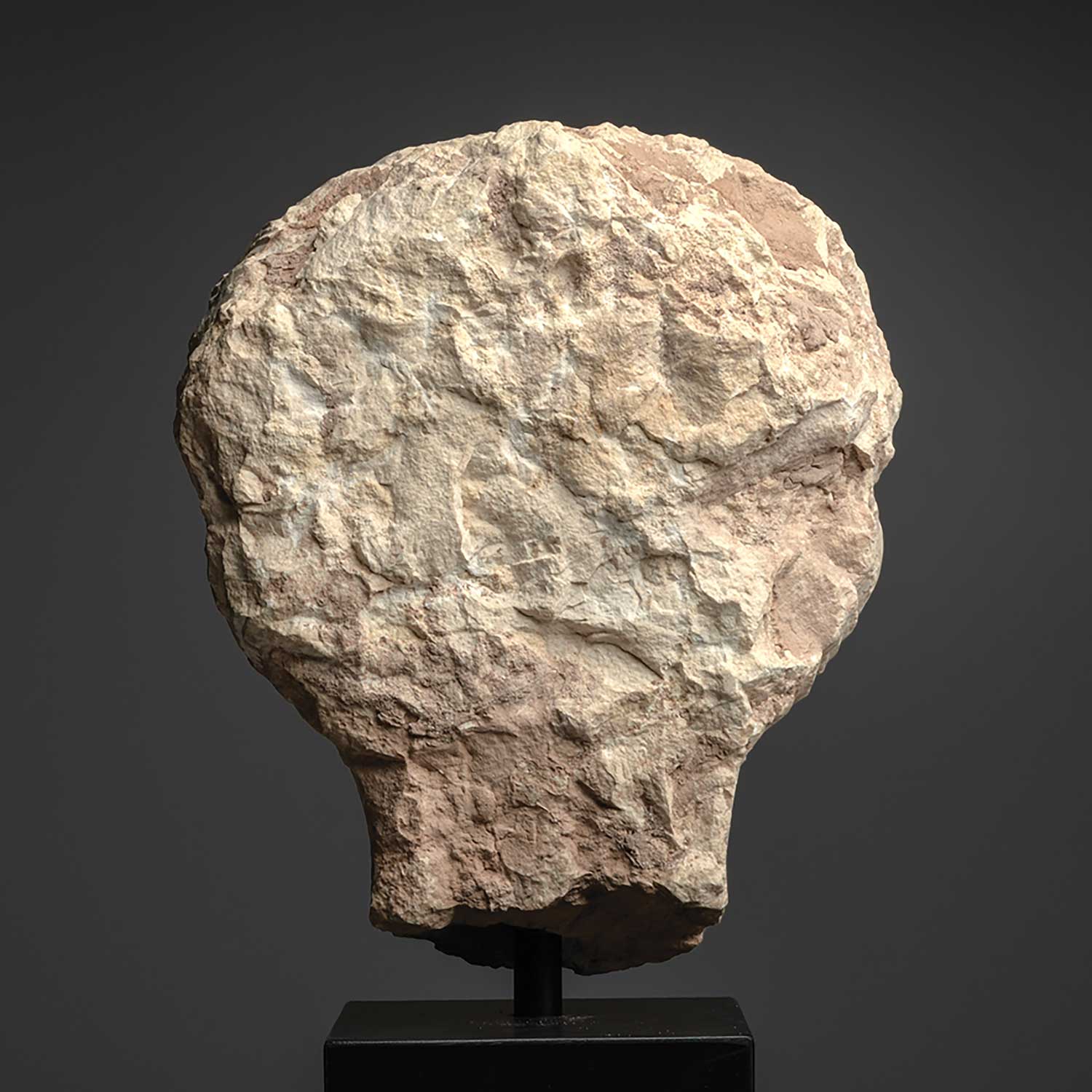 A good Palmyrene Limestone Portrait Head of a Youth<br><em>ca. 2nd - 3rd century CE</em>