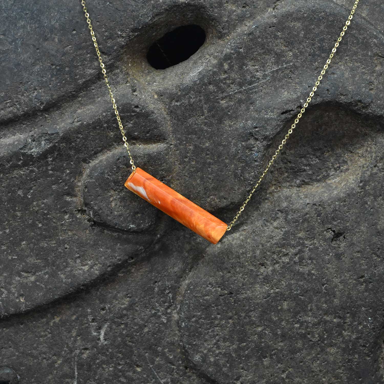 A Pre-Columbian Spondylus Shell Bead Pendant, Peru, ca. 300 - 500 CE