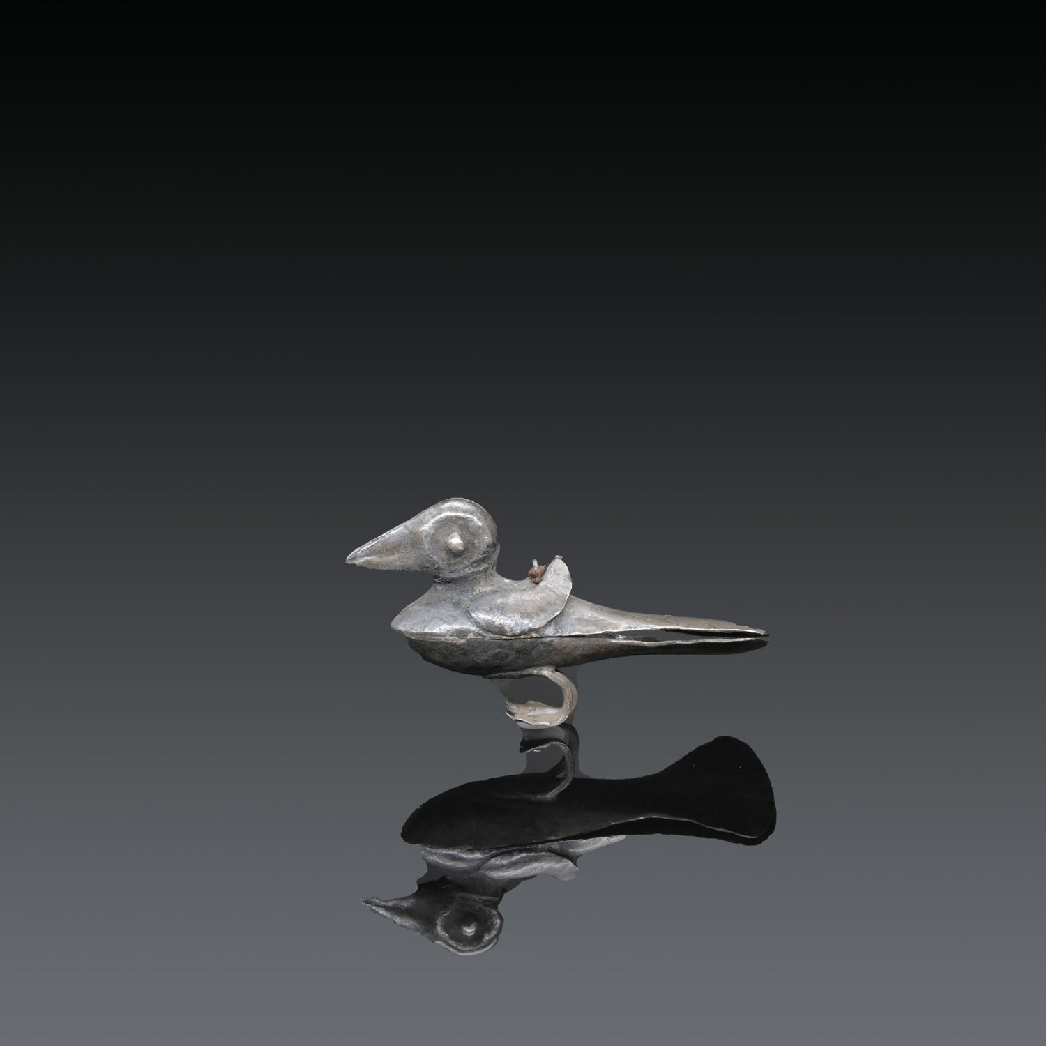A Moche-Chimu Silver Sheet Bird Pendant<br><em>ca. 750 - 1000 CE</em>