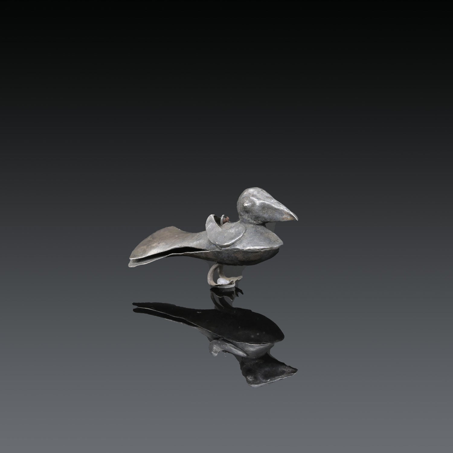A Moche-Chimu Silver Sheet Bird Pendant<br><em>ca. 750 - 1000 CE</em>