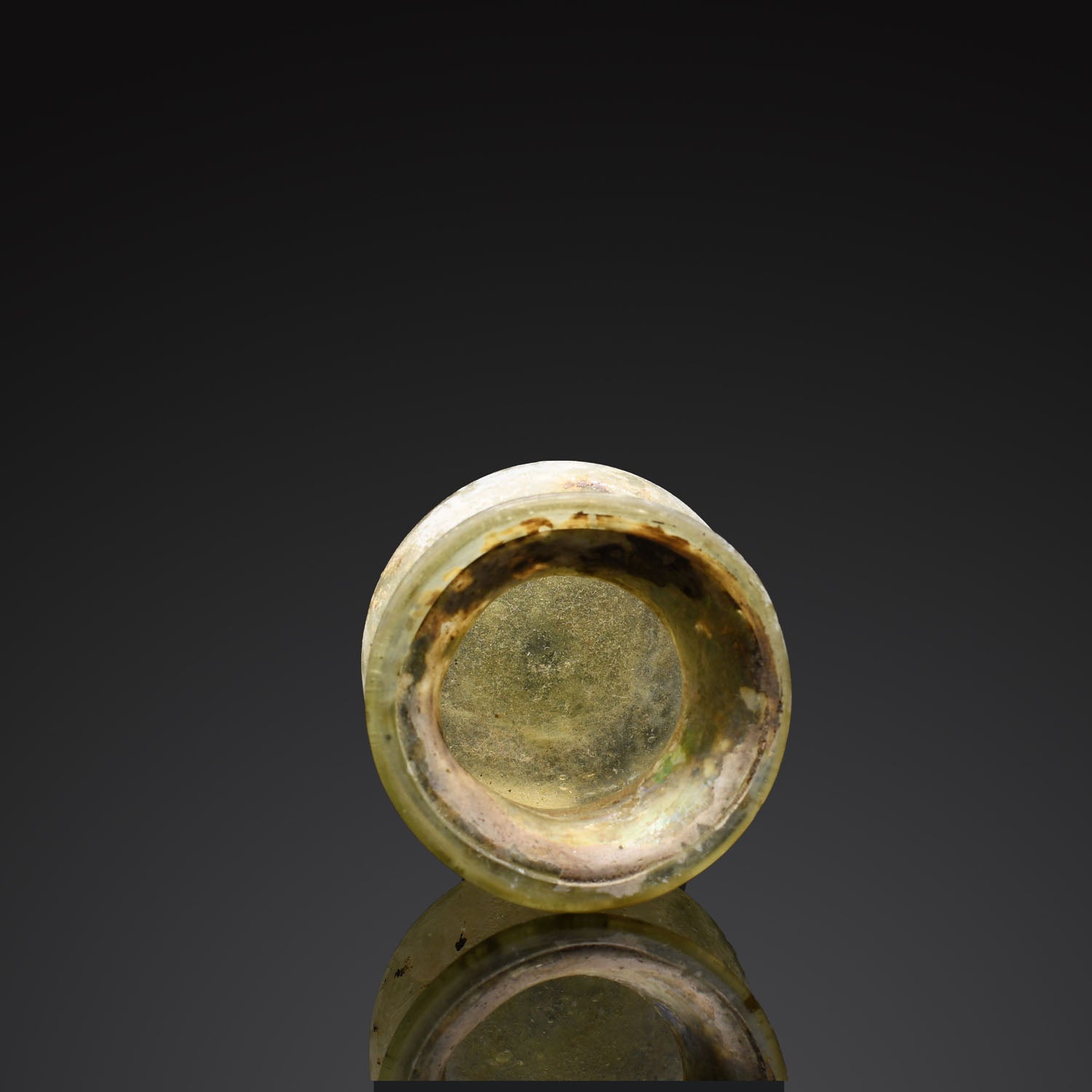 A Roman Green Glass Vessel, Roman Imperial Period, ca. 1st - 2nd century CE