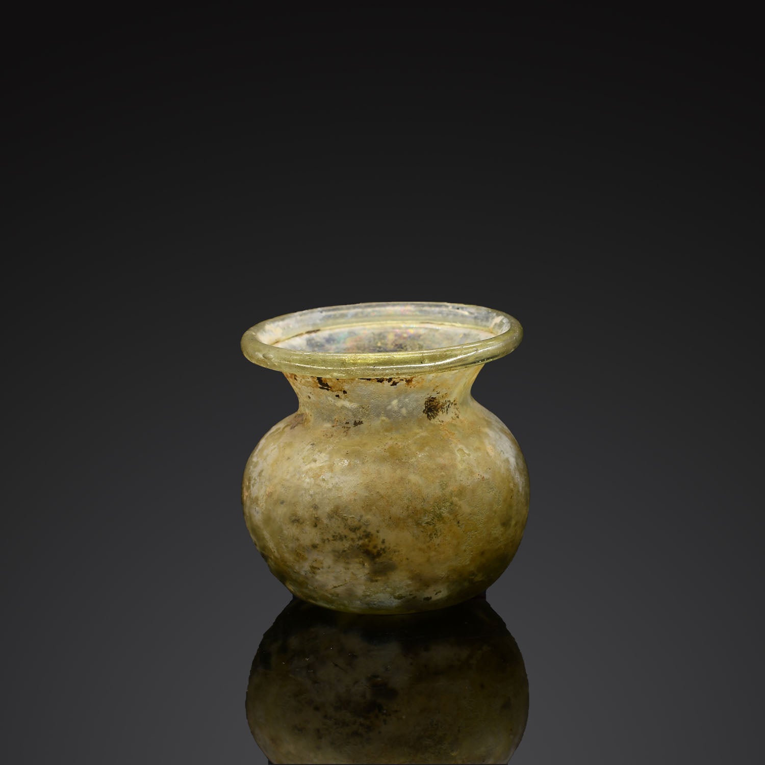 A Roman Green Glass Vessel, Roman Imperial Period, ca. 1st - 2nd century CE