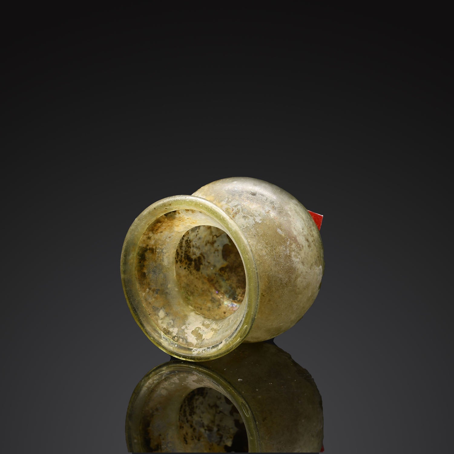 A Roman Green Glass Vessel, Roman Imperial Period, ca. 1st - 2nd century CE