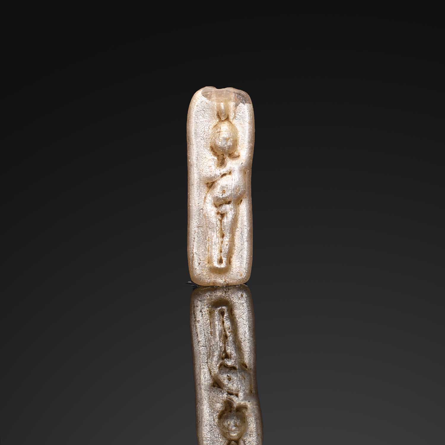 An Egyptian Electrum-Glass Bead depicting Harpokrates, Early Roman Imperial Period, ca. 50 BCE – 50 CE