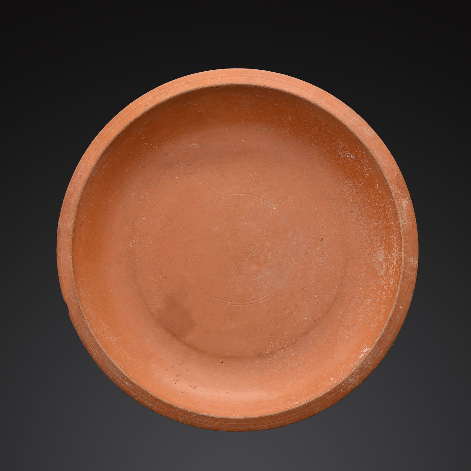 A large Roman Redware Dish, Late Imperial Period, ca. 4th century CE