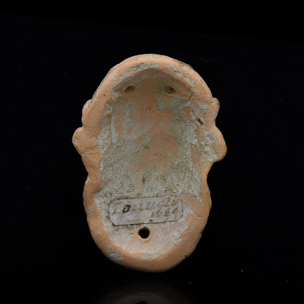 A Roman Terracotta Appliqué of Silenus, ca. 1st century BCE/CE