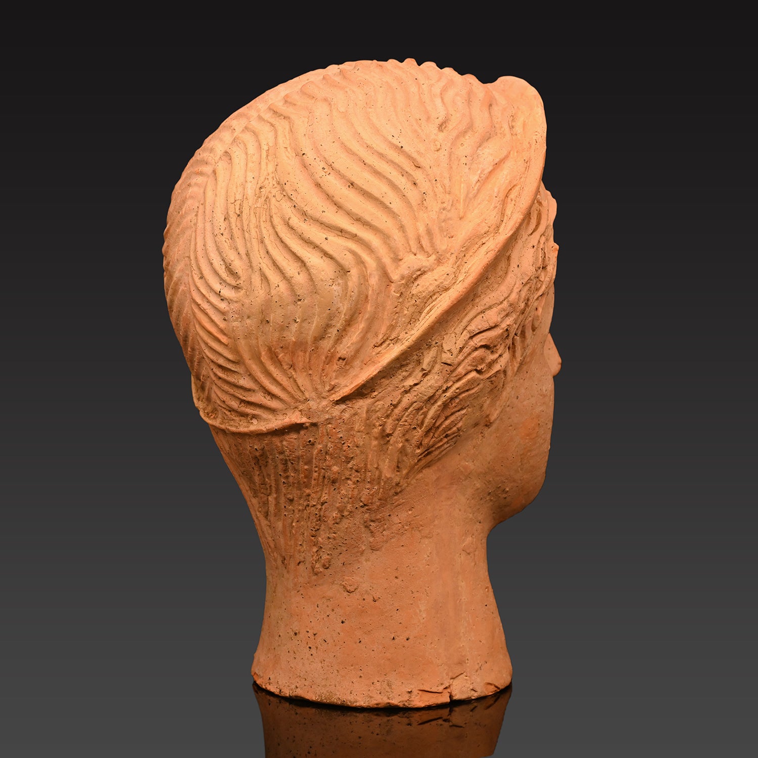 An Etruscan Terracotta Votive Head of A Goddess, ca. 4th - 3rd century BCE