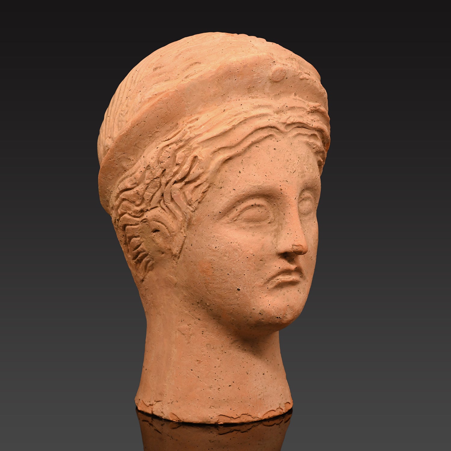 An Etruscan Terracotta Votive Head of A Goddess, ca. 4th - 3rd century BCE