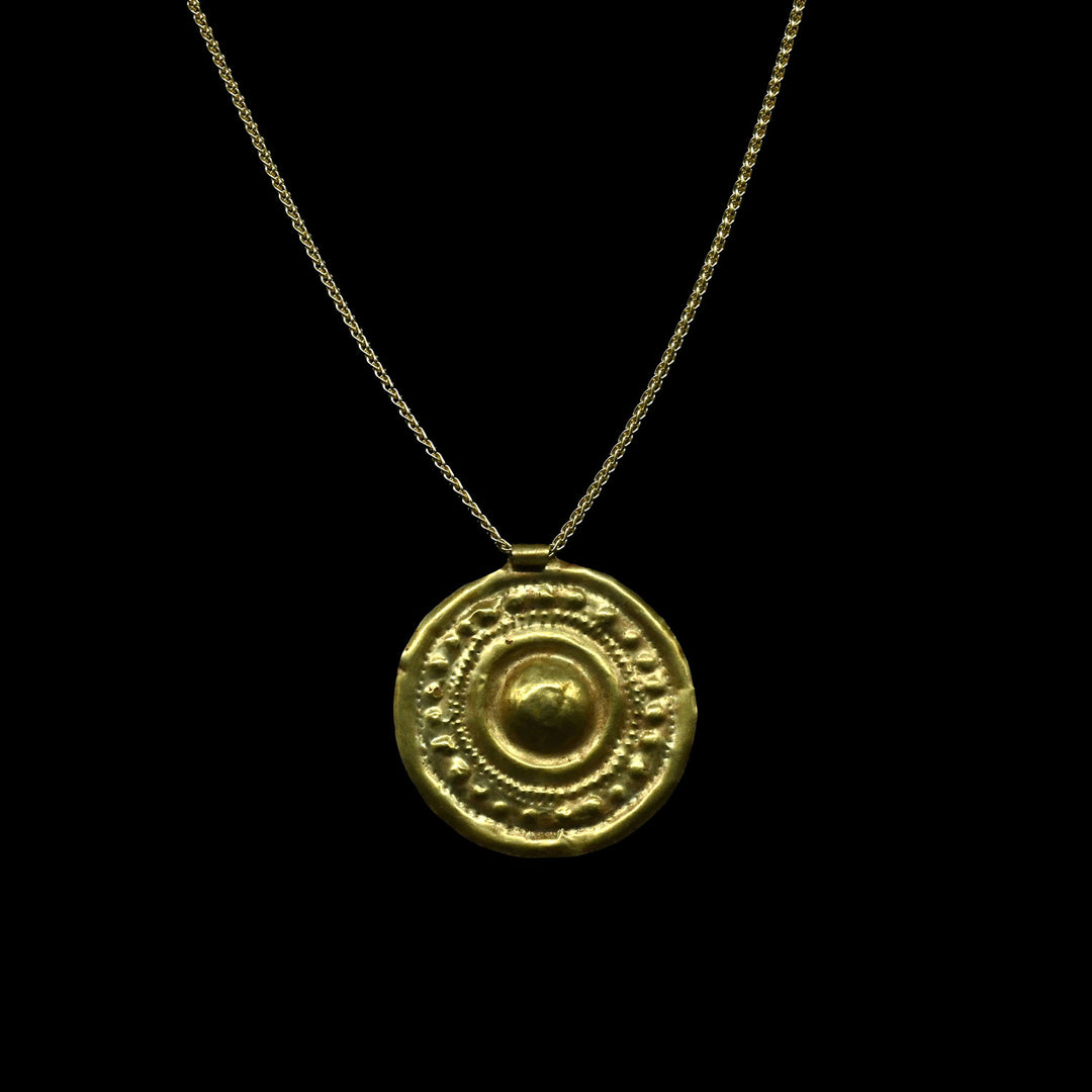 A large Western Asiatic Gold Disk Pendant, ca late 2nd Millennium BCE