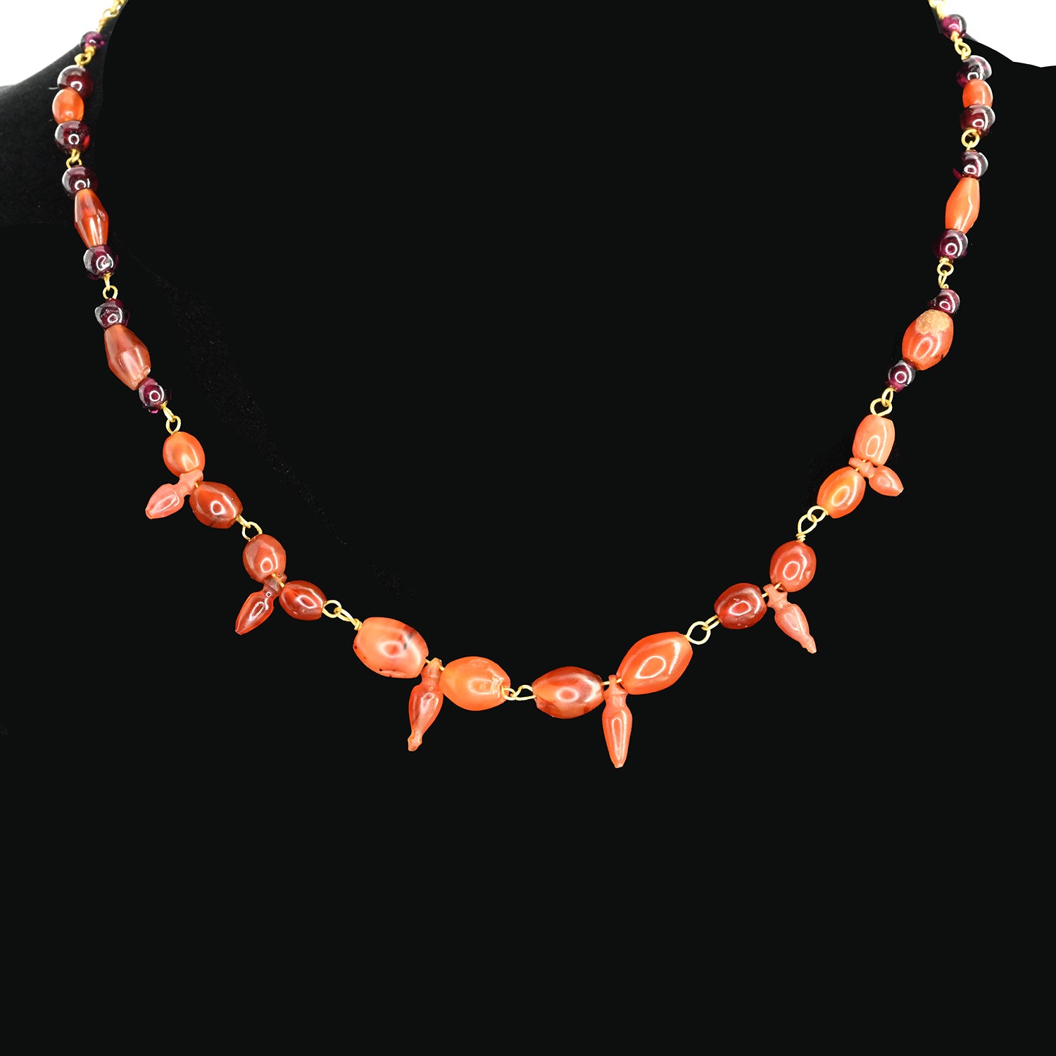 A Roman Carnelian and Garnet Necklace with Amphora Shaped Pendants, Roman Imperial Period, ca. 2nd - 3rd century CE