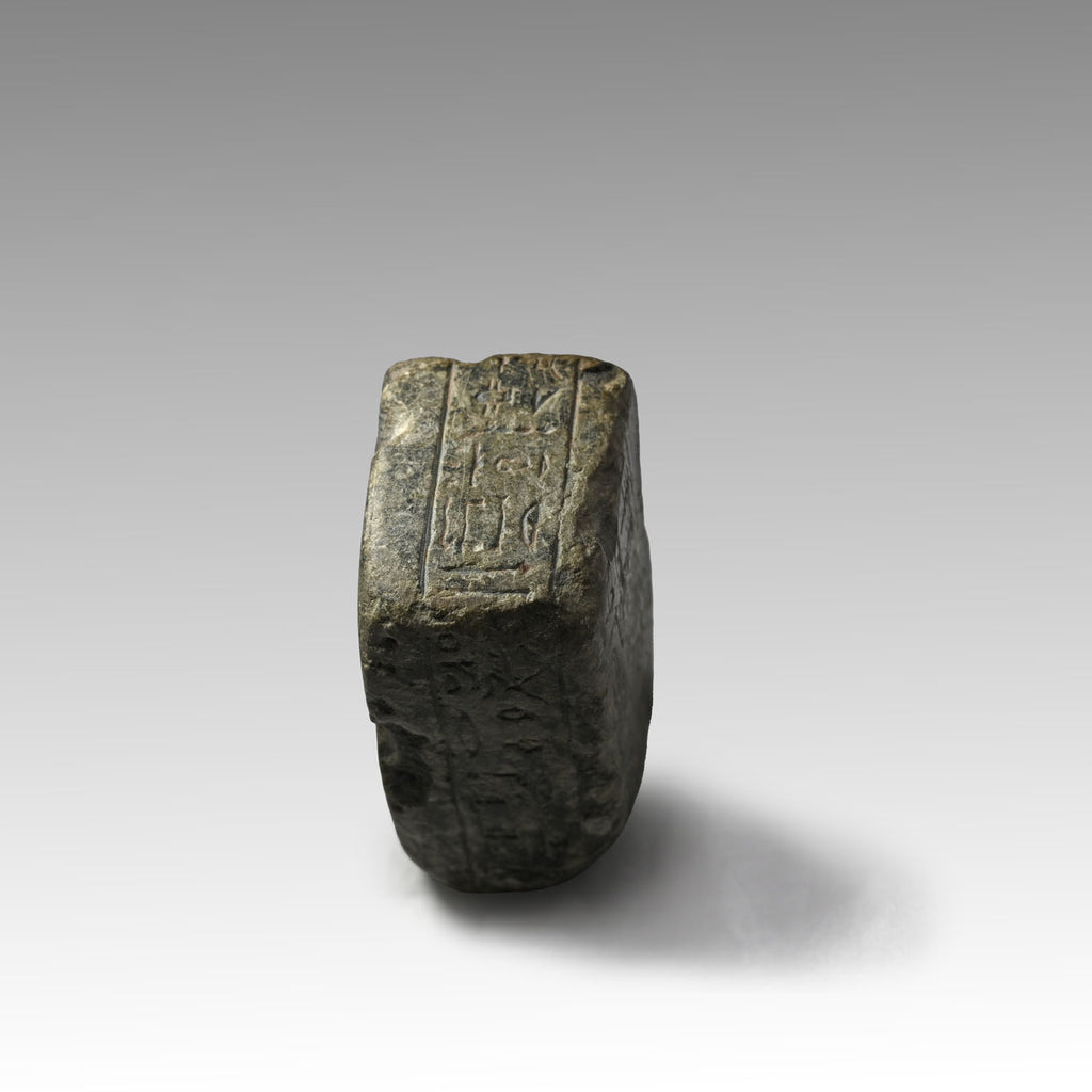 An Egyptian Granite Fragmentary Base with Inscription, Late Period, 29th-30th Dynasty, ca. 380 - 332 BCE