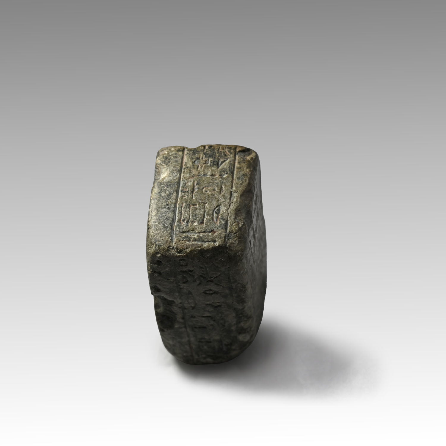 An Egyptian Granite Fragmentary Base with Inscription, Late Period, 29th-30th Dynasty, ca. 380 - 332 BCE