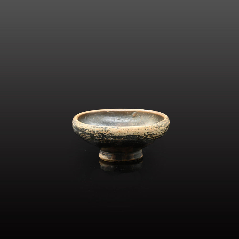 A small Greek Blackware Salt Dish, ca. 4th century BCE