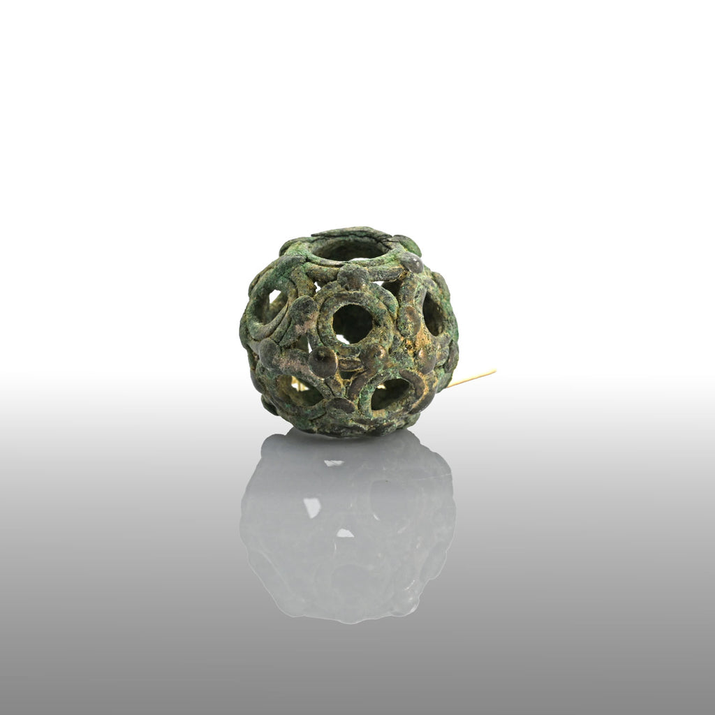 A Roman bronze openwork dodecahedron, ca. 2nd - 4th century CE