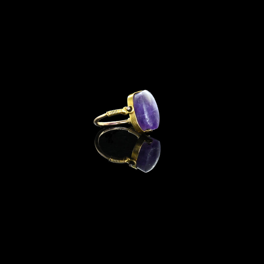 An Egyptian Amethyst Scaraboid, Middle Kingdom, ca. 2040 - 1783 BCE