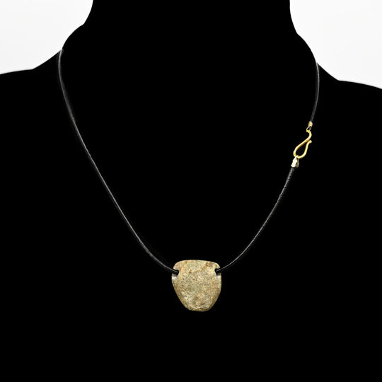 A Maya Greenstone Snake head Pendant, ca. 500 - 800 CE