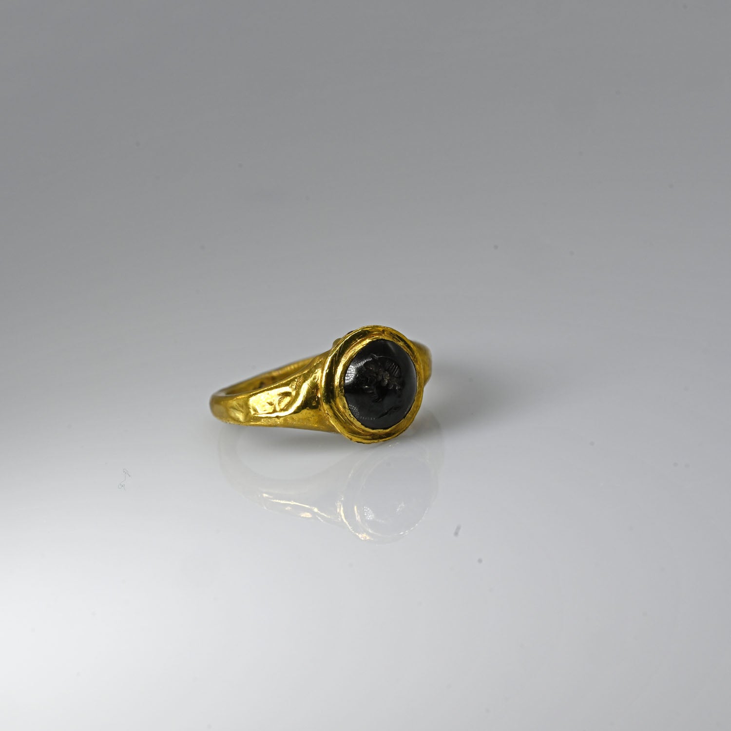 A Roman garnet Ringstone Intaglio, Roman Imperial Period, ca. 1st - 2nd century CE