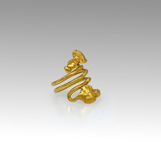 A Published Egypto-Roman Gold Spiral Snake Ring with Isis and Ptah Terminals, Roman Imperial Period, ca. 1st century CE