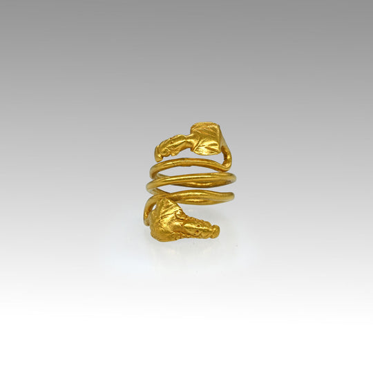 A Published Egypto-Roman Gold Spiral Snake Ring with Isis and Ptah Terminals, Roman Imperial Period, ca. 1st century CE