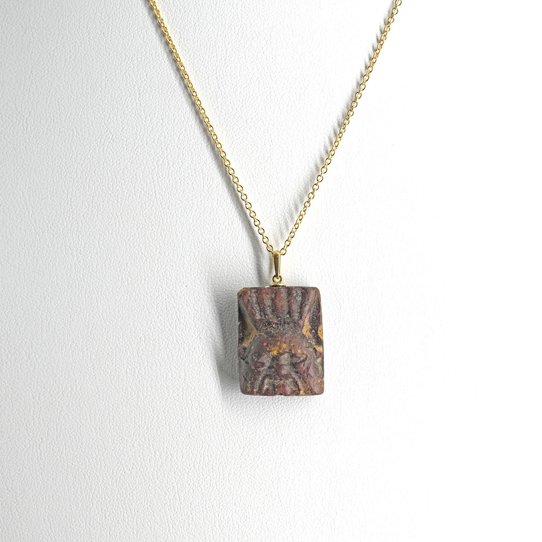 An Egyptian Faience Bes Plaque, Late Period, ca.  664 - 332 BCE