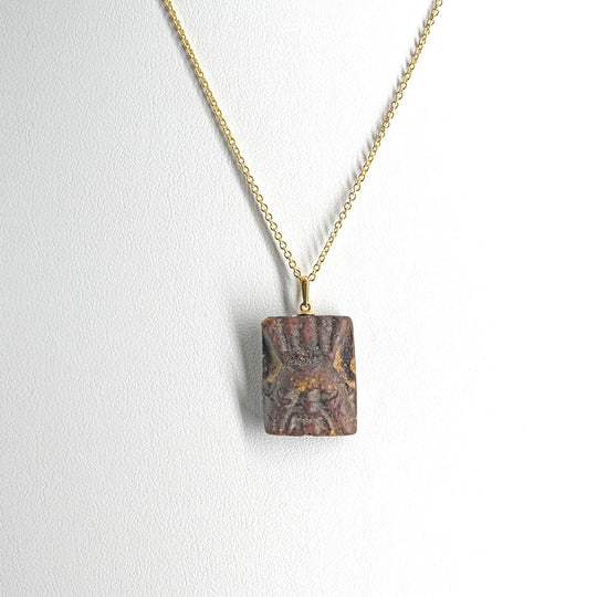 An Egyptian Faience Bes Plaque, Late Period, ca.  664 - 332 BCE