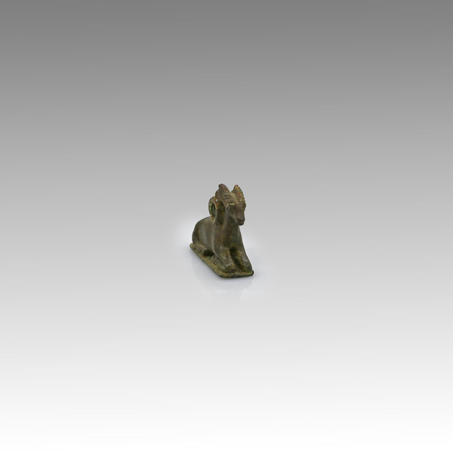 An Egyptian Bronze Weight in the form of a Ram, New Kingdom, Amarna Period , 18th Dynasty, ca 1352 - 1336 BCE