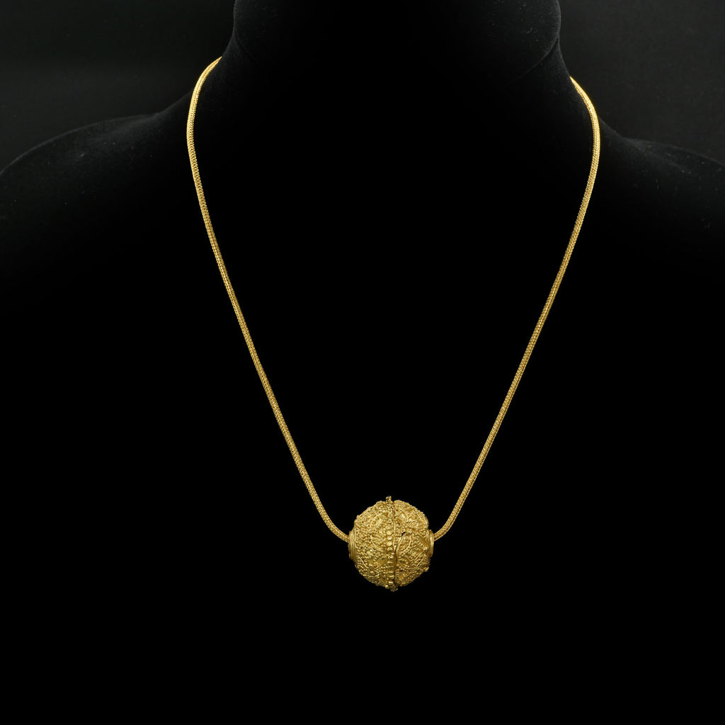 A Greek Gold Filigree Bead, Hellenistic Period, ca. 3rd - 1st century BCE