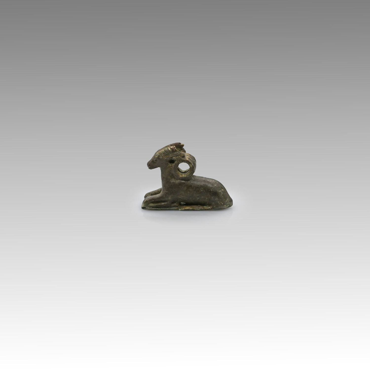 An Egyptian Bronze Weight in the form of a Ram, New Kingdom, Amarna Period , 18th Dynasty, ca 1352 - 1336 BCE