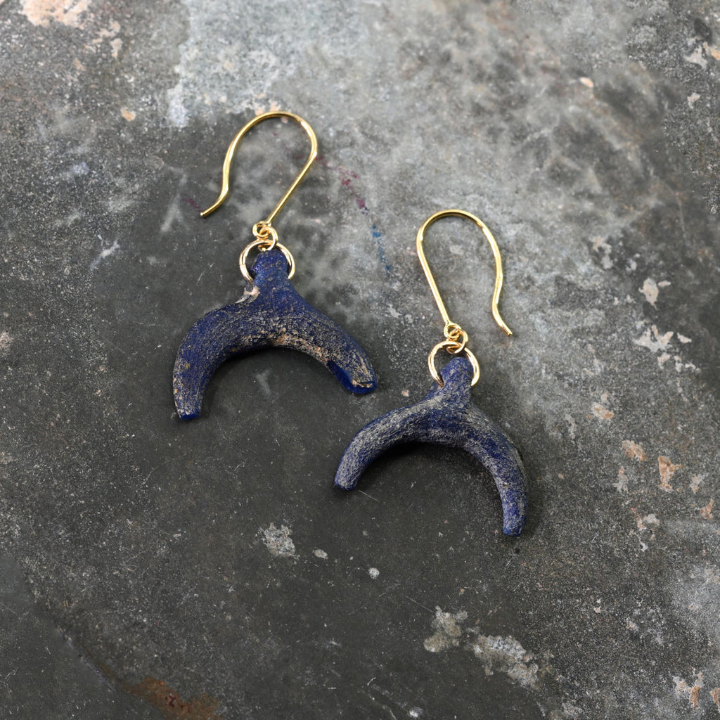 A pair of Roman Blue Glass Lunulae Earrings, Roman Imperial Period, ca. 1st - 2nd century CE