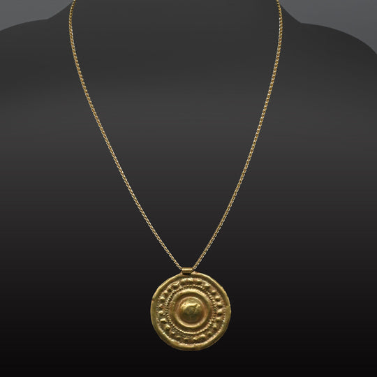 A large Western Asiatic Gold Disk Pendant, ca late 2nd Millennium BCE