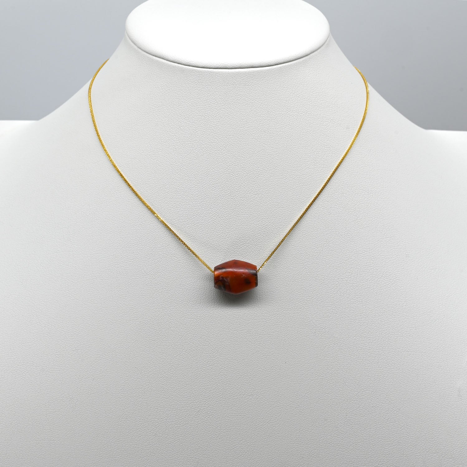 An Egyptian Carnelian Bead Pendant, Middle Kingdom, 11th - 12th Dynasty, ca. 2030 - 1650 BCE