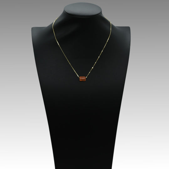 An Egyptian Carnelian Wedjat eye Pendant, New Kingdom, 18th - 19th Dynasty, ca. 1550 - 1290 BCE
