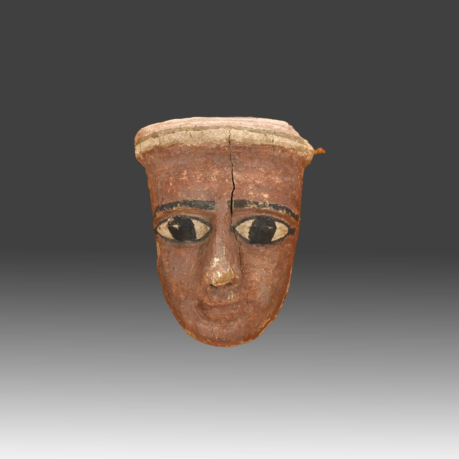 A Egyptian Wood Mummy Mask, Late Period, ca. 664 - 332 BCE