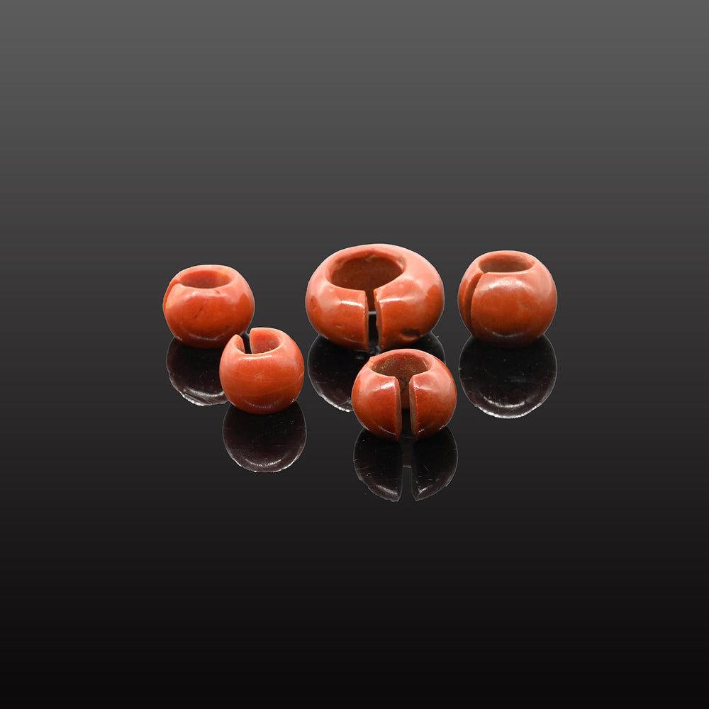 Group of five Egyptian Red Glass Penannular Earrings and Hair Rings, New Kingdom, 18th Dynasty, 1550-1295 BCE