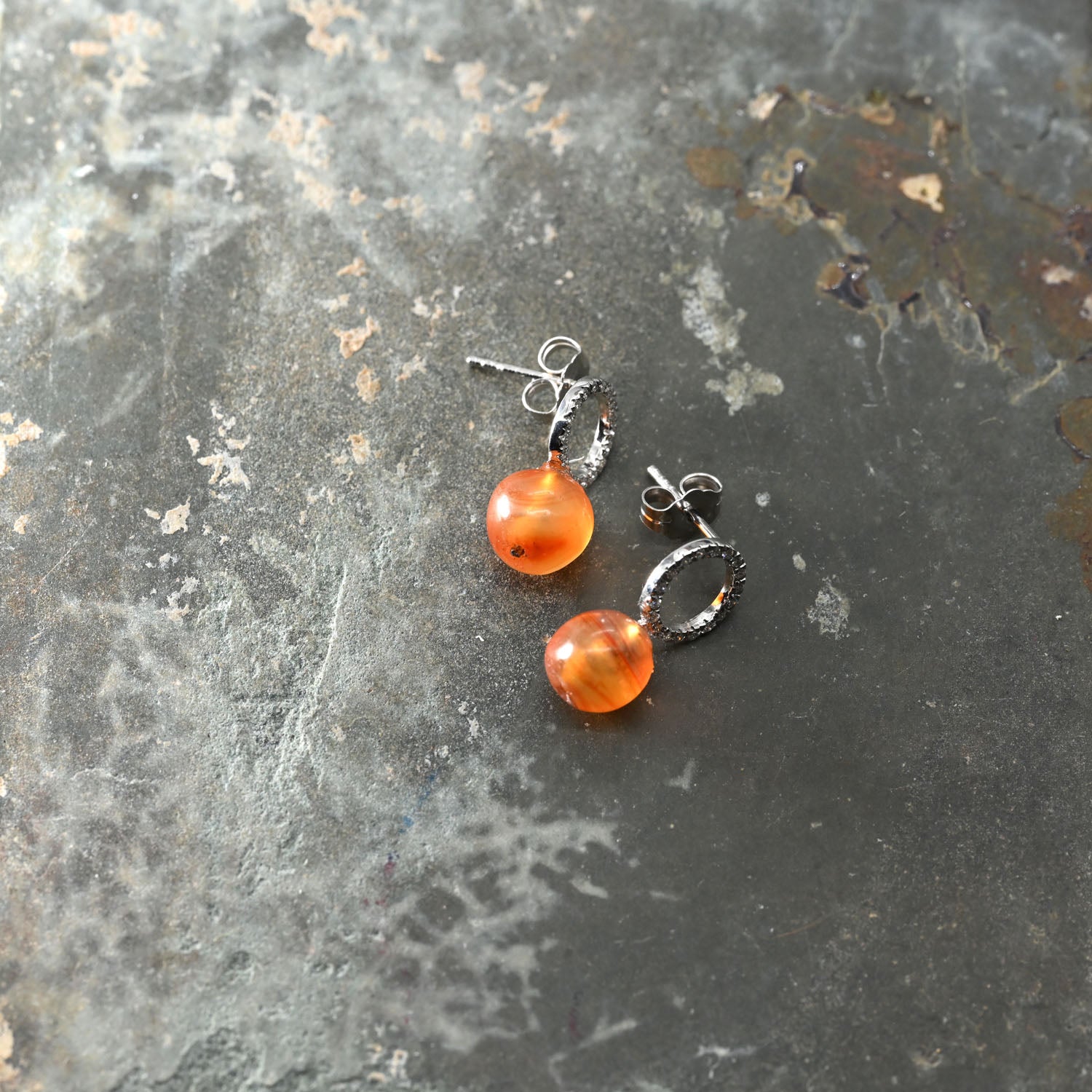 A pair of Egyptian Carnelian Ball Bead earrings, Middle Kingdom, ca.  2141 - 2122 BCE