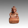 A Moche Terracotta Stirrup-Spout Vessel Depicting a Seated Dignitary, Moche II, ca. 300 - 500 CE