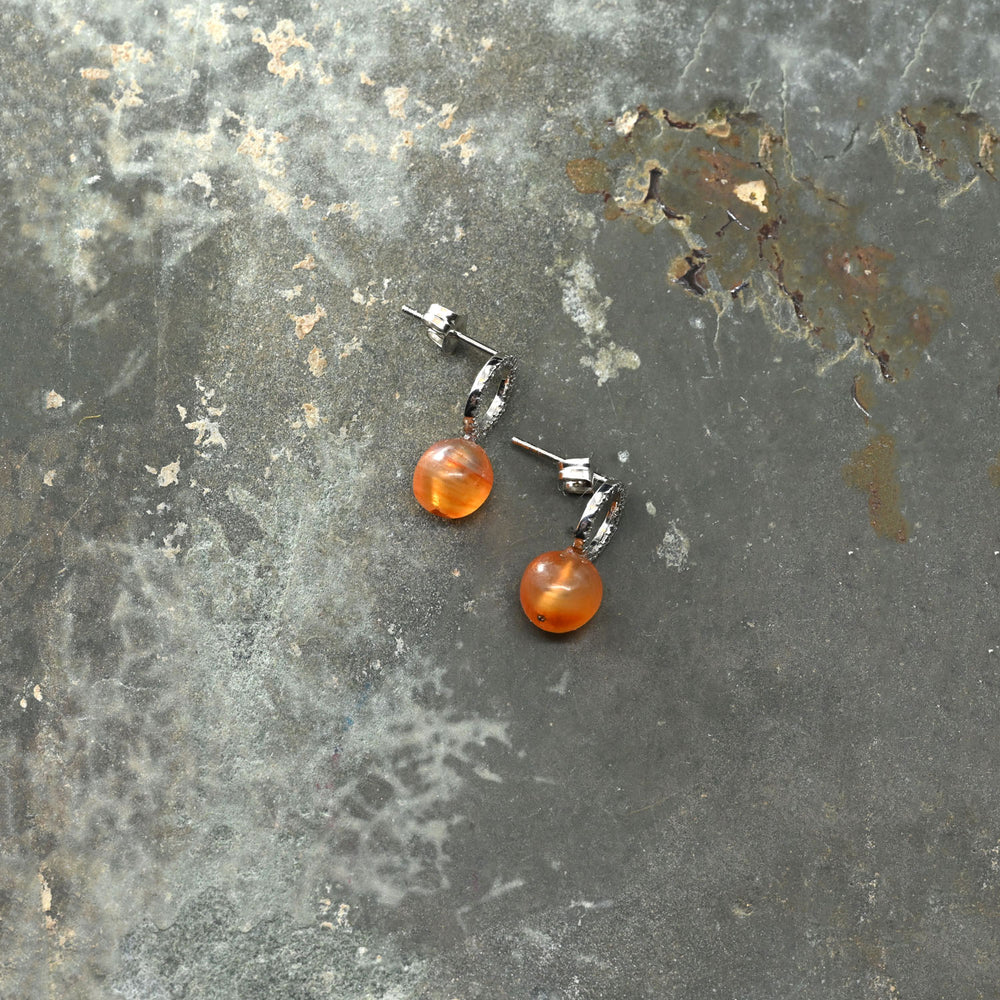 A pair of Egyptian Carnelian Ball Bead earrings, Middle Kingdom, ca.  2141 - 2122 BCE